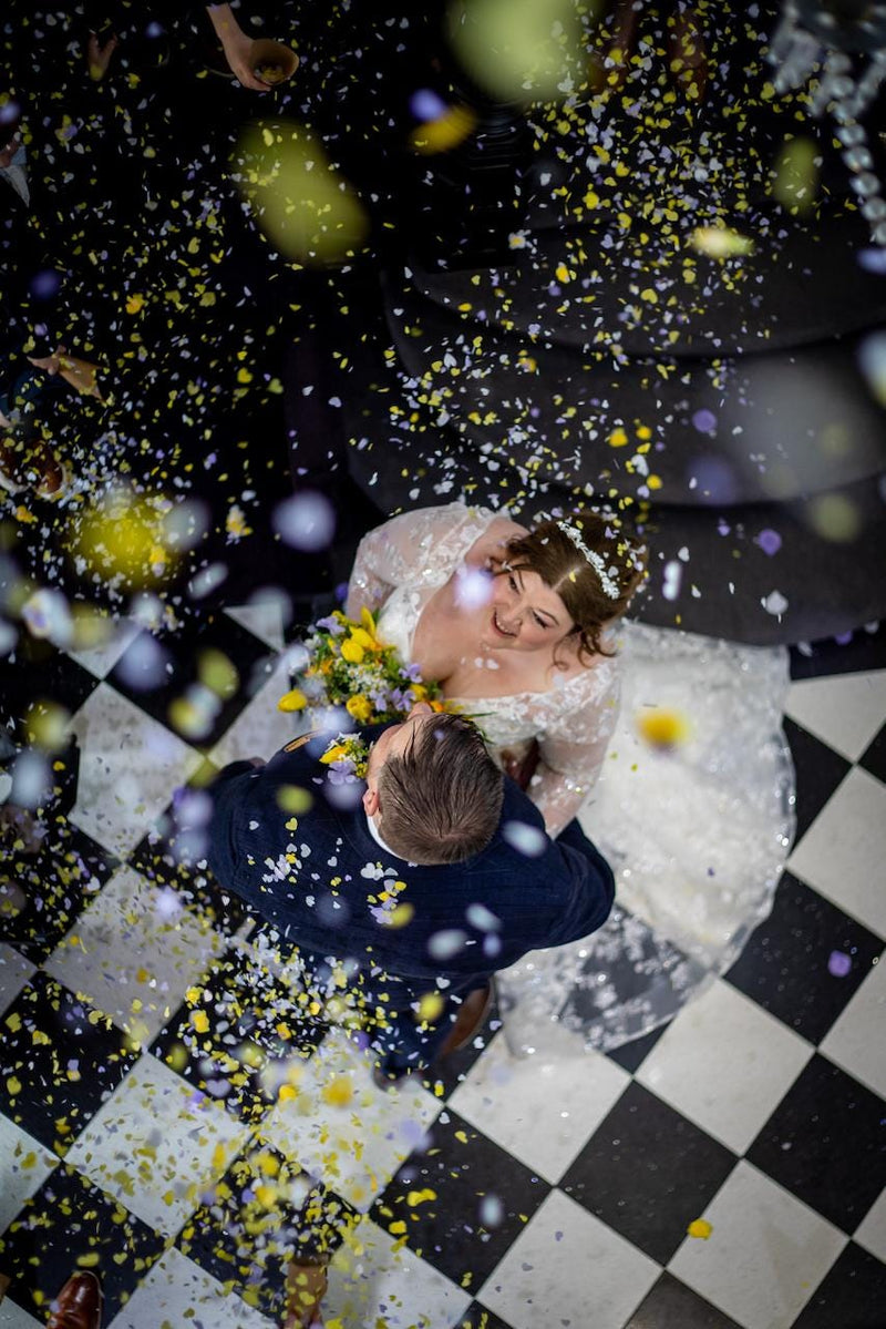 Heart confetti thrown at a customer celebration
